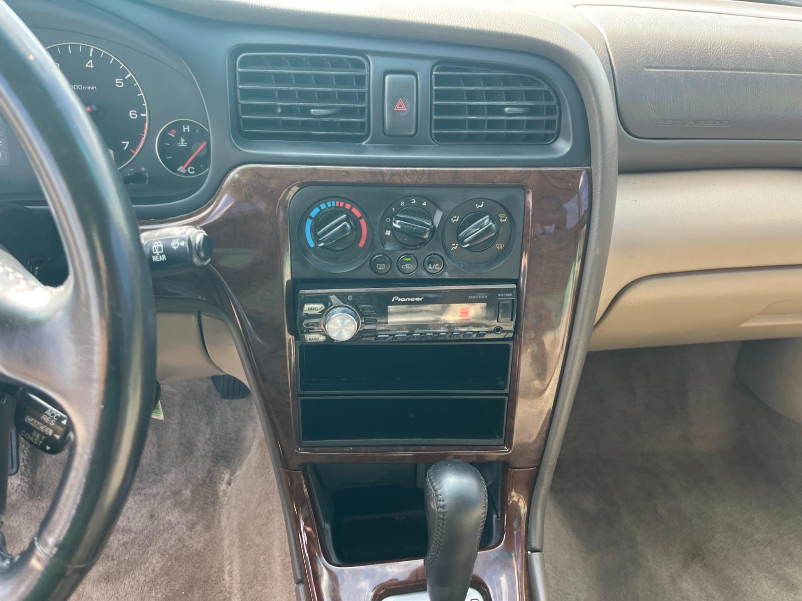 2003 green /TAN Subaru Outback Limited Wagon (4S3BH686737) with an 2.5L H4 SOHC 16V engine, 5-Speed Manual Overdrive transmission, located at 14700 Tomball Parkway 249, Houston, TX, 77086, (281) 444-2200, 29.928619, -95.504074 - Photo #15